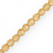 Perline sfaccettate tonde 6 mm ocra ambra