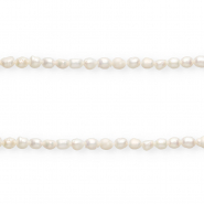 Perle di acqua dolce imperfette chicco di riso 7x5mm bianco naturale