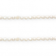Perle di acqua dolce imperfette pepita tonda 6-7x5mm bianco naturale