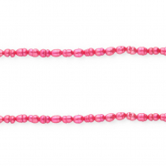 Perle di acqua dolce imperfette chicco di riso rosa