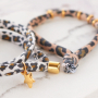 Crea simpatici elastici per capelli e braccialetti con nastro elastico cucito con stampa leopardo