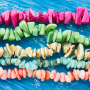 Ispirazione con perline in conchiglia e filo elastico