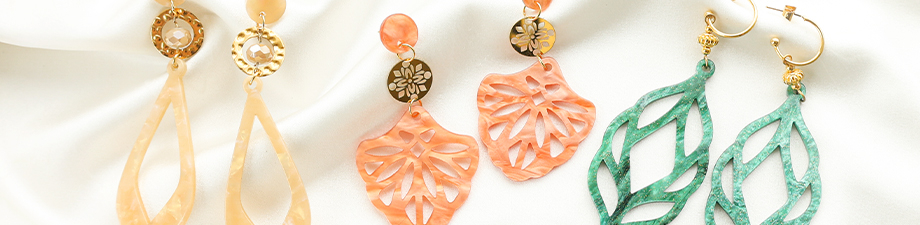 Resina e perline in resina / velluto Resina e perline in resina / velluto